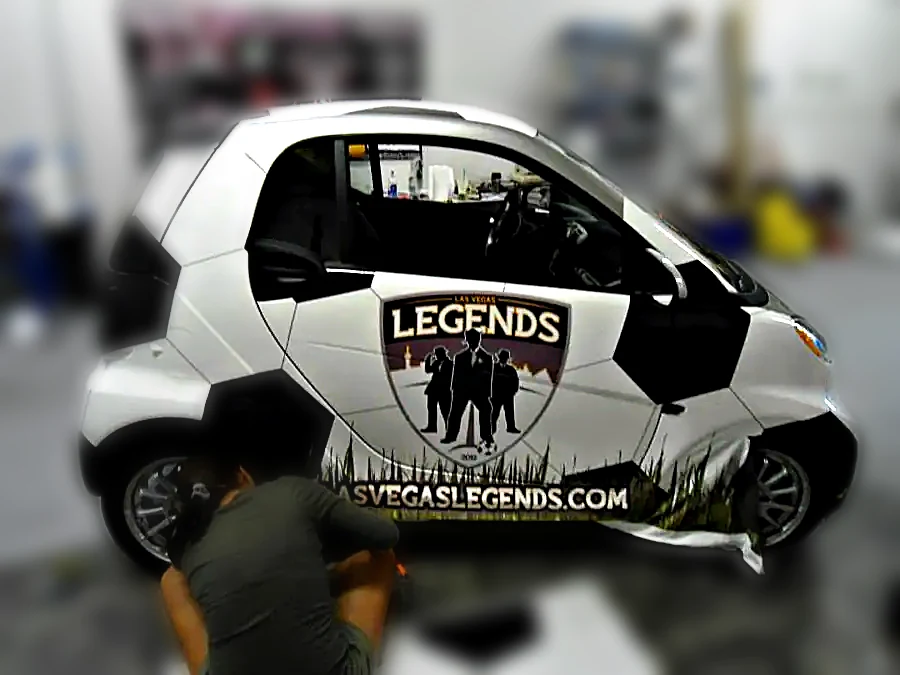 Vehicle wrap installation inside Chicago Fleet Wraps